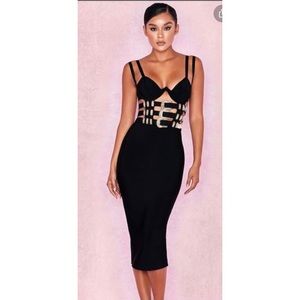 Houseofcb sexy Black midi dress with gold buckles.